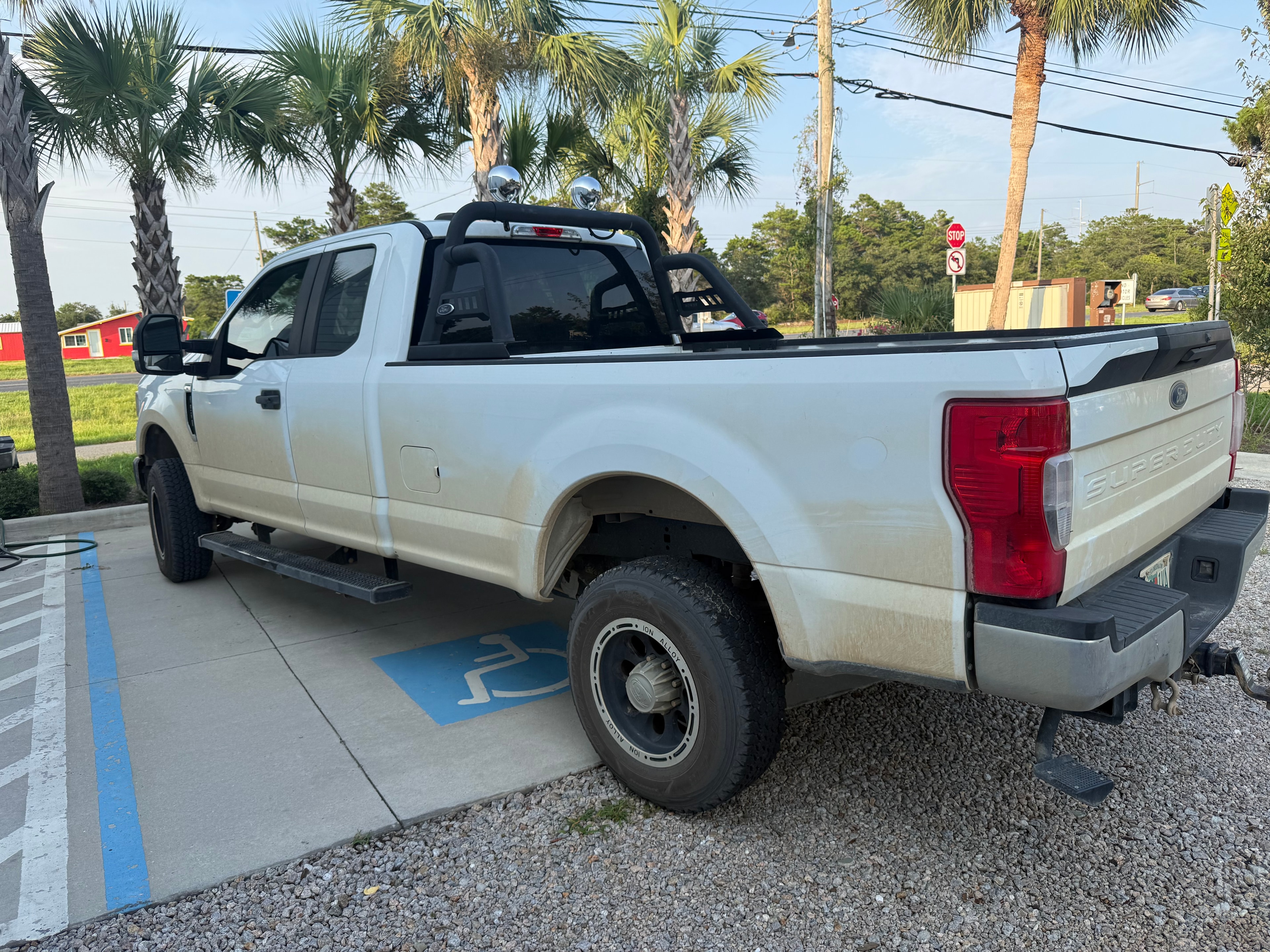 White Ford Super Duty rear view after detailing