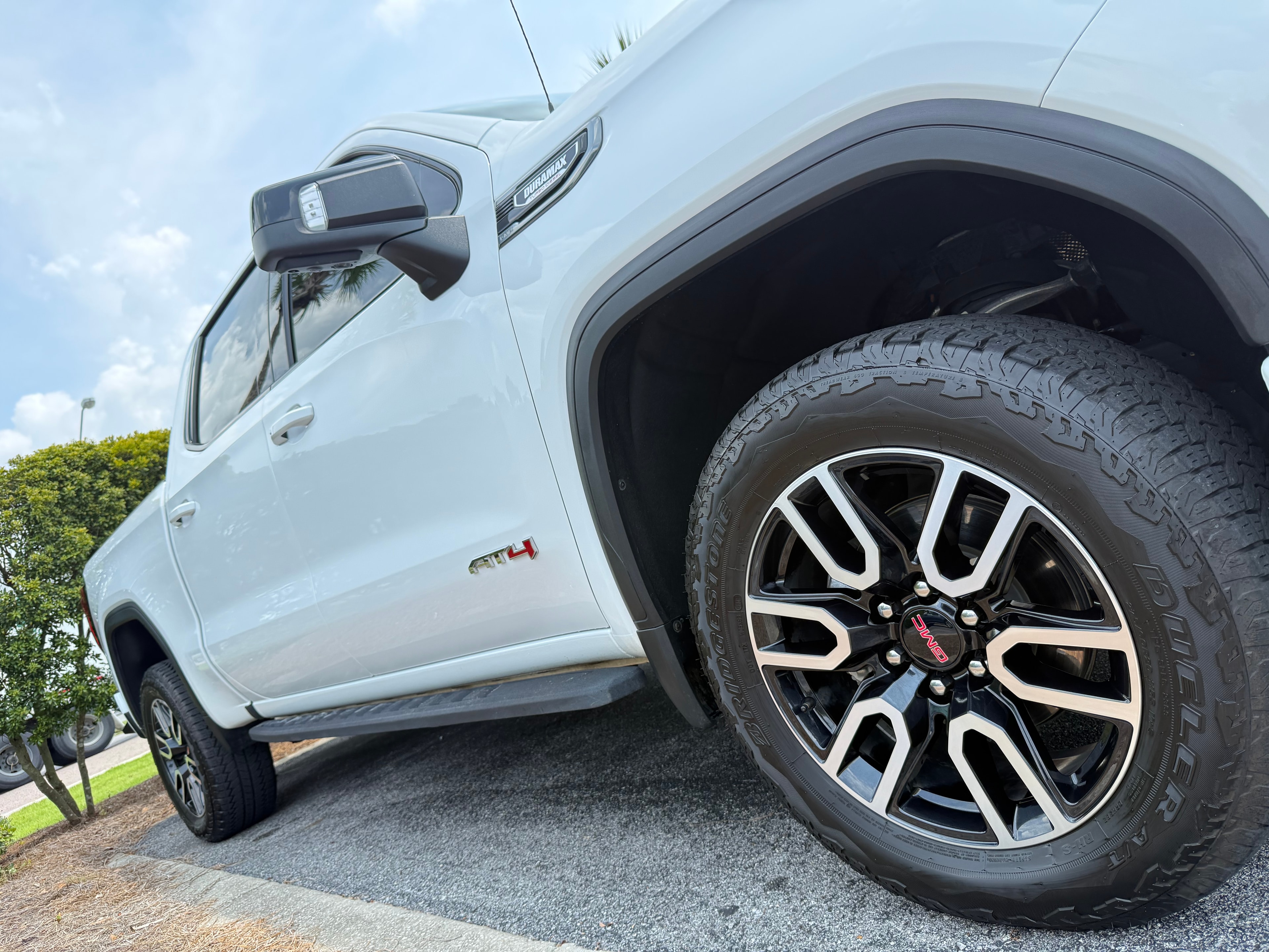 Close-up of GMC AT4 wheel and tire after detail
