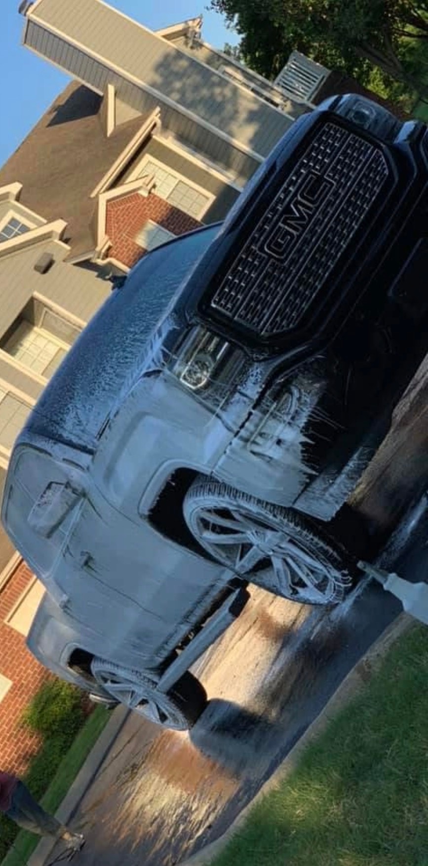 GMC truck being foam washed